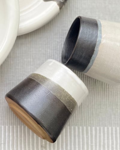 Black and white ceramic cup